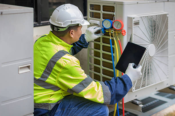 Professional Heat Pump Repair technician working in Walcott, IA